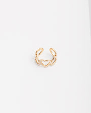 Anello Angelica in acciaio inossidabile color oro . Ha un design a fascia formato da 5 cuori: i tre centrali  hanno una fila di strass mentre i due finali sono lisci. Il verso dei cuori è alternato ed è regolabile sul retro.