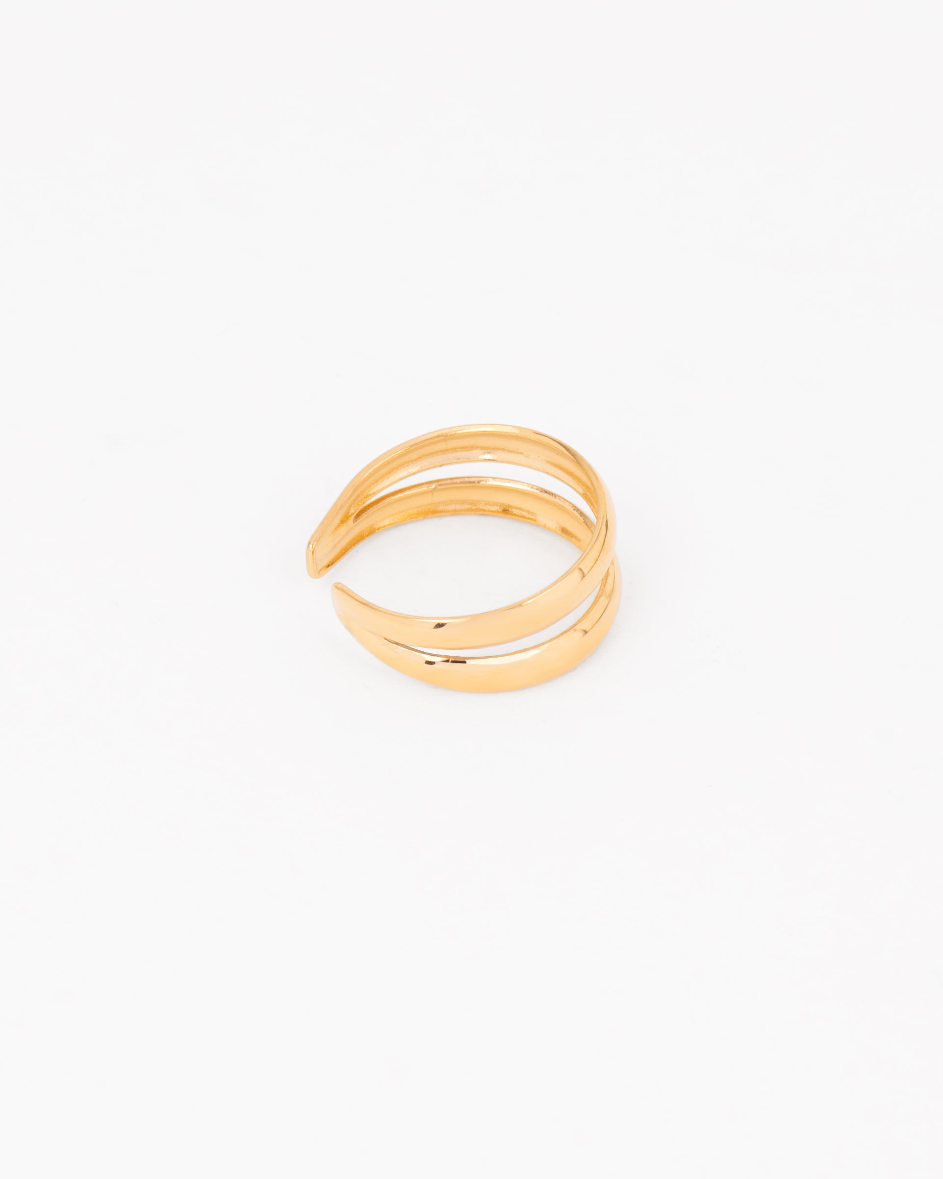 Anello Paola in acciaio inossidabile in colore oro. Ha un design a doppio filo unito alle due estremità ed è regolabile. È realizzato in materiale anallergico e resistente all'acqua. L'immagine lo ritrae lateralmente.